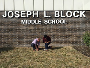 Nate and Ezazul in front of Joseph L. Block Middle School.